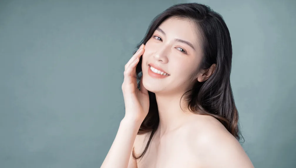 Woman displaying clear, hydrated skin to illustrate results from What is profhilo and how does it work?
